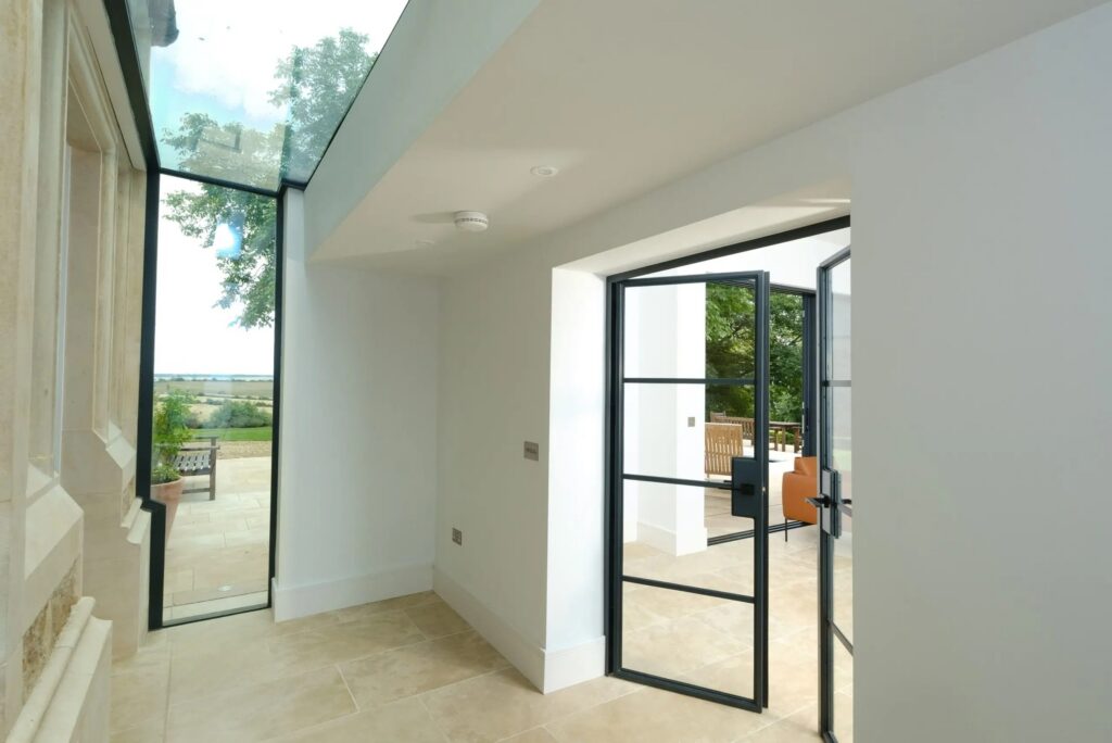 Dry House Frameless Glass Link in Oakham from inside cropped scaled