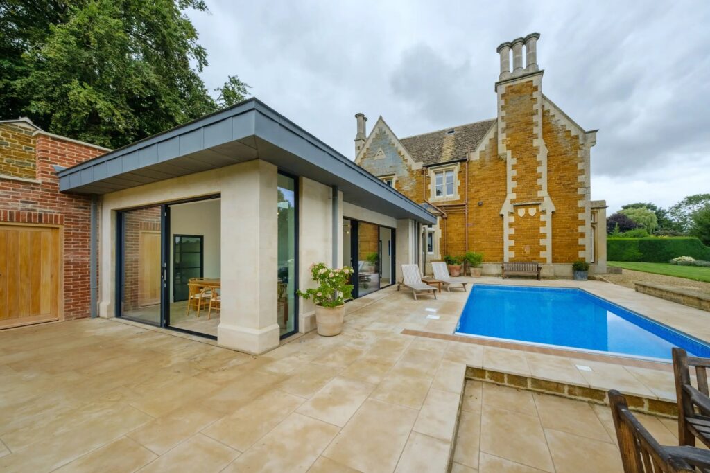 Dry house sliding glass doors in Oakham from outside scaled