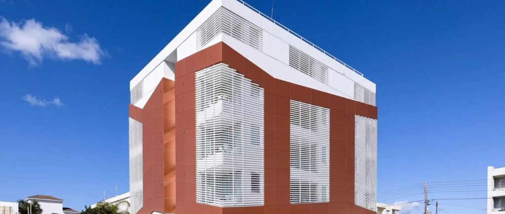 apartment building of studio apartments in greece using Sieger slim sliding doors around the balcony areas