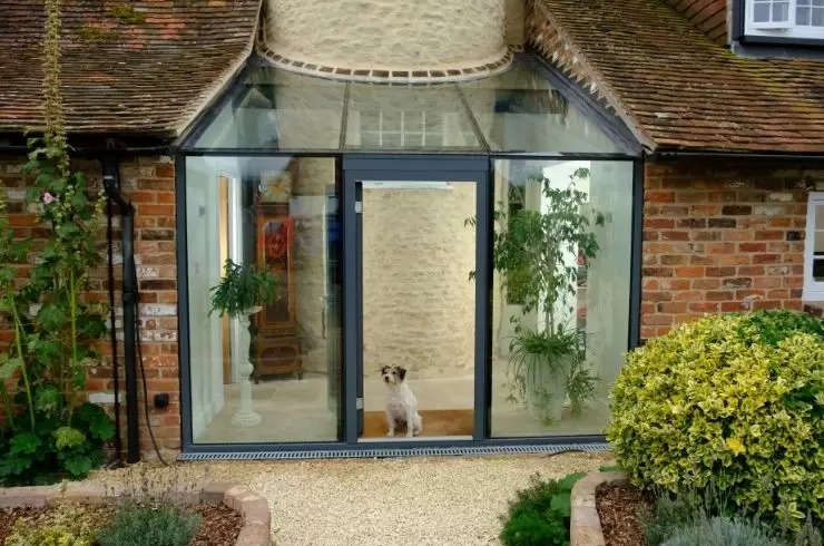 architectural glazing on a cottage period property in the english countryside modern glass extnsion.jpg