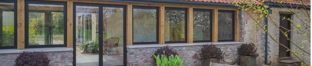 external view of a home refurbishment project in Bristol with a double opening Sieger Lux Casement Door and slim framed aluminium windows