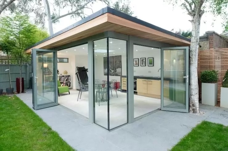 garden room with multiple aluminium bifold doors