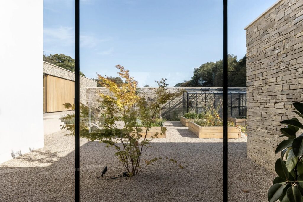 meadow house contemporary replacement home looking outside scaled