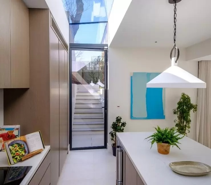 sieger lux pivot door installed in an extension on a grade 2 listed townhouse in london.jpg