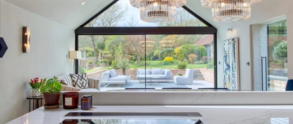 sliding glass doors with ultra slim framing and sightline in a modern home renovation