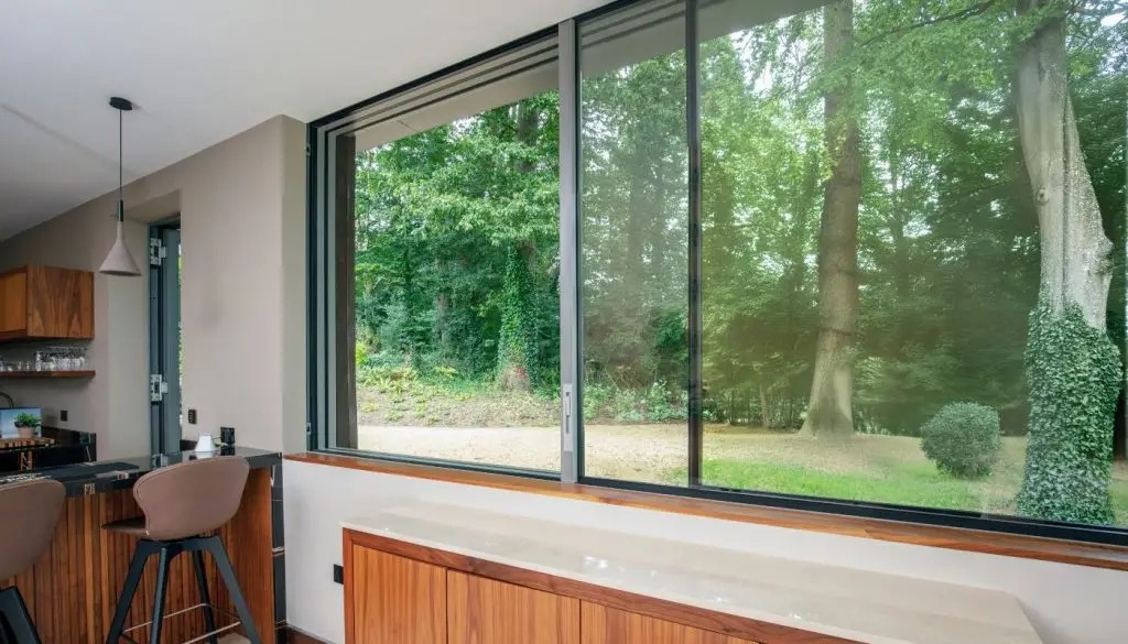 sliding windows contemporary somerset home waterfalls sieger systems 1400x800 1 1024x585