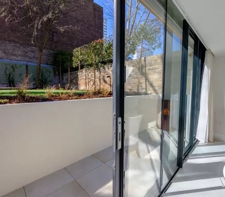 slim aluminium sliding patio doors in an extension in Notting Hill in London