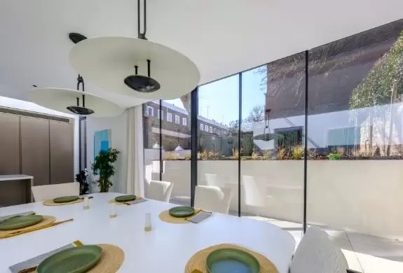 three pane sieger slim sliding aluminium patio door in a modern home extension.jpg